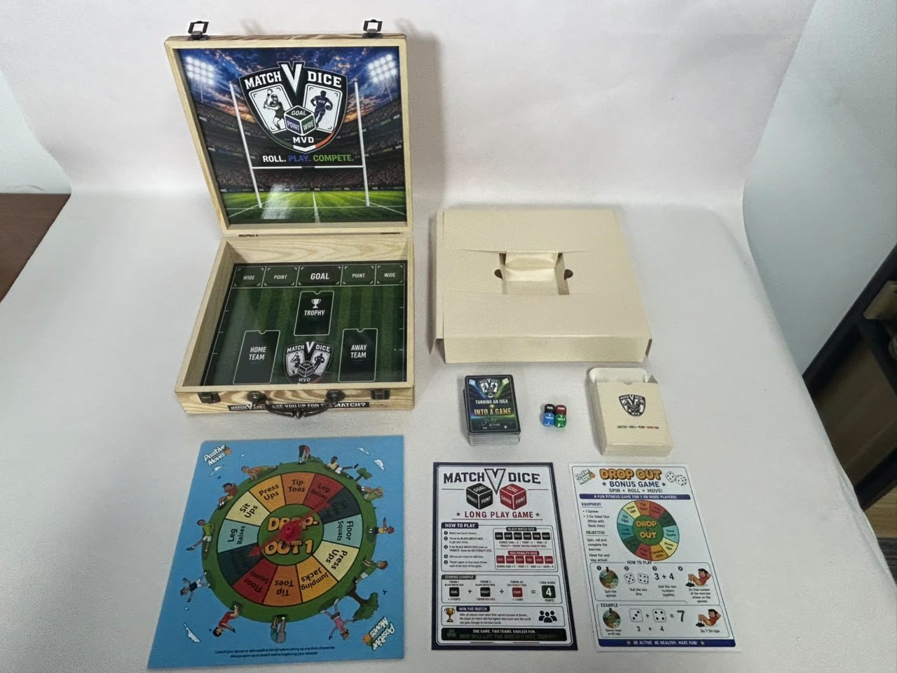 Full Match V Dice set laid out: box, county cards, dice, Drop Out spinner and rule cards